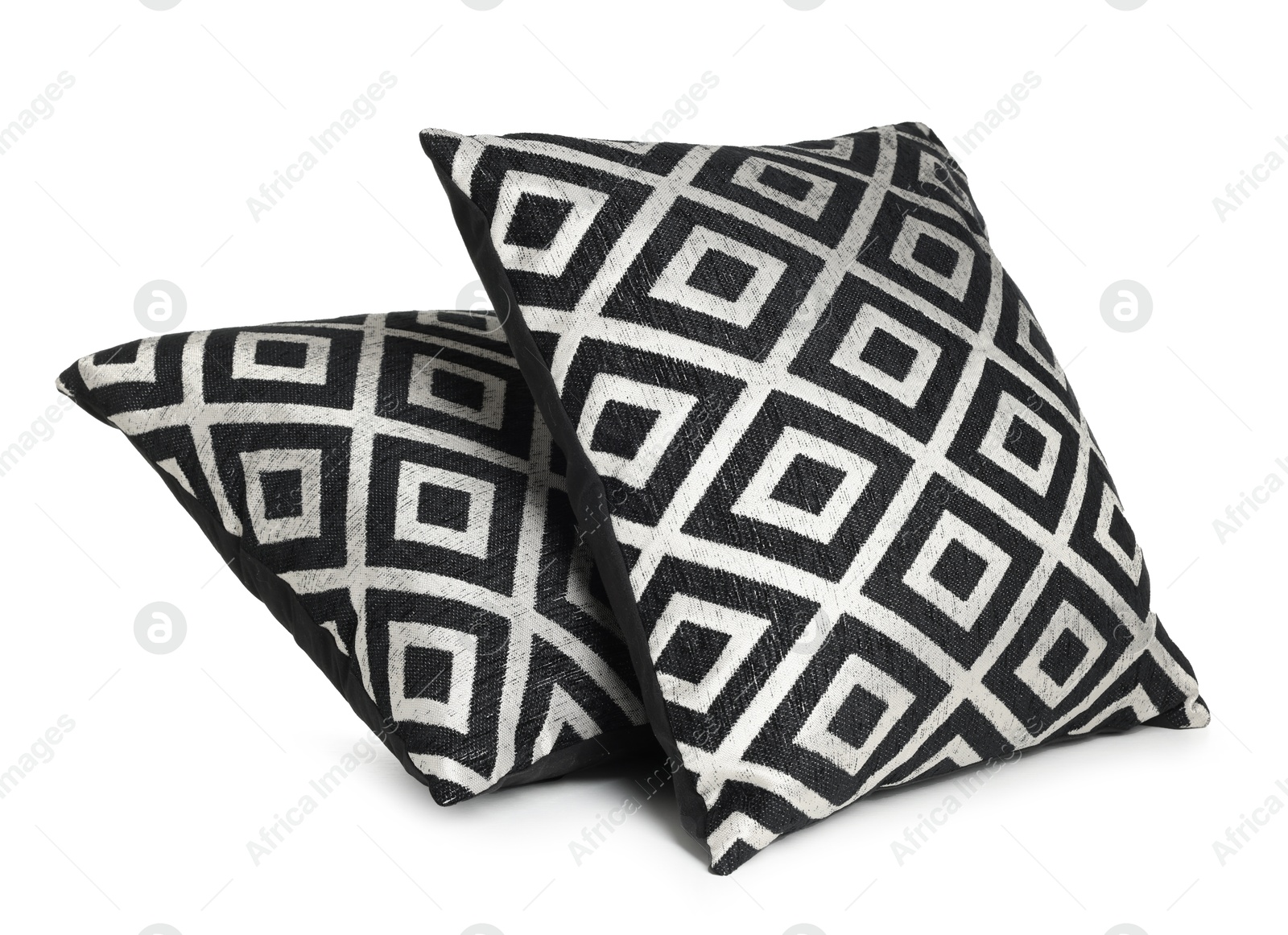 Two stylish cushions with pattern isolated on white Photo of Two stylish cushions with pattern isolated on white
