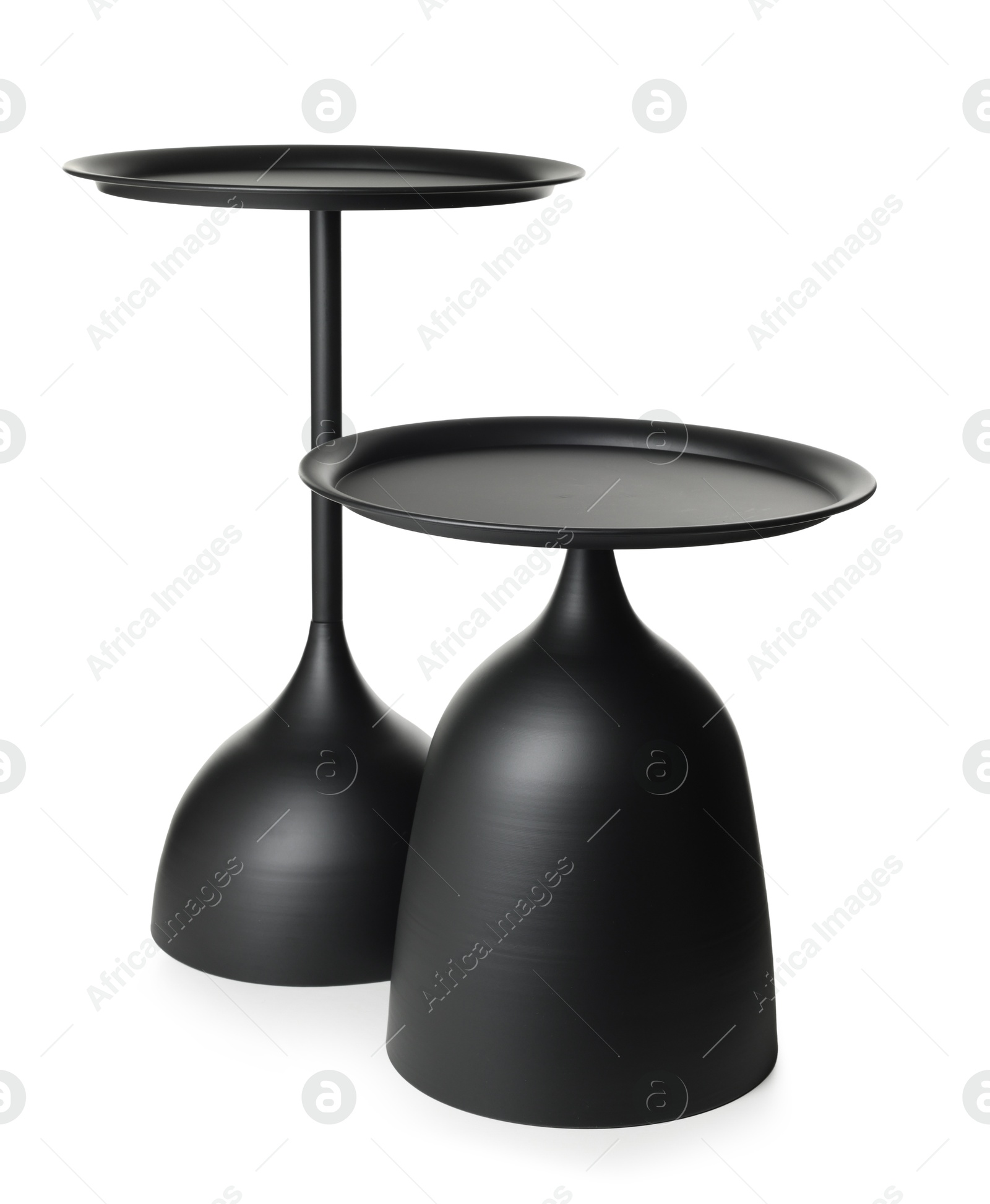 Two stylish black round coffee tables isolated Photo of Two stylish black round coffee tables isolated