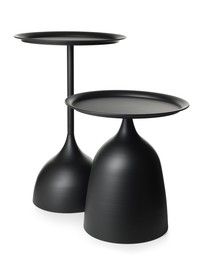 Photo of Two stylish black round coffee tables isolated