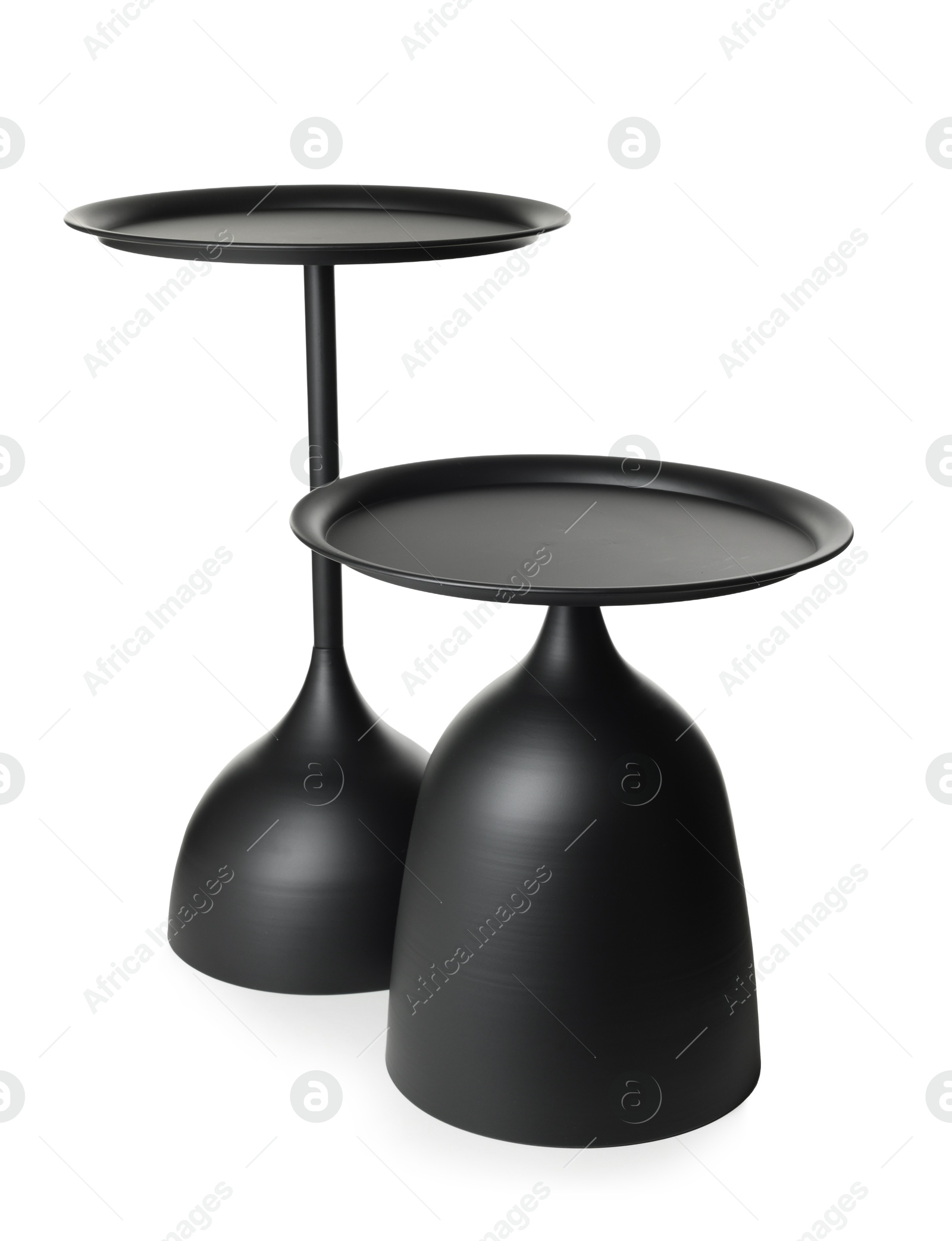 Two stylish black round coffee tables isolated Photo of Two stylish black round coffee tables isolated