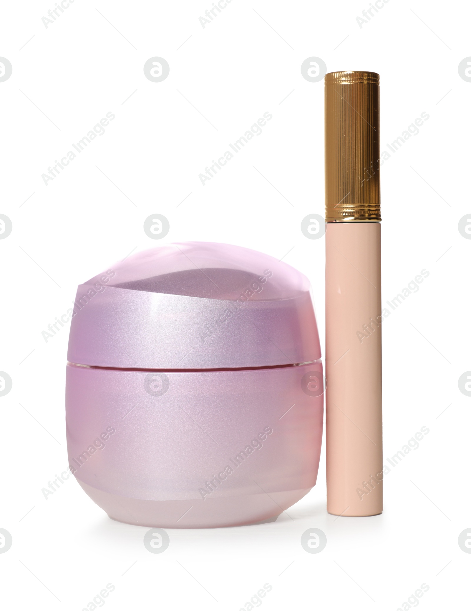 Cosmetic products. Cream and concealer isolated on white Photo of Cosmetic products. Cream and concealer isolated on white