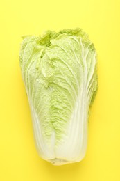 Photo of Fresh Chinese cabbage on yellow background, top view