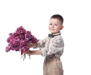 Photo of Little boy with bouquet of lilac flowers on white background
