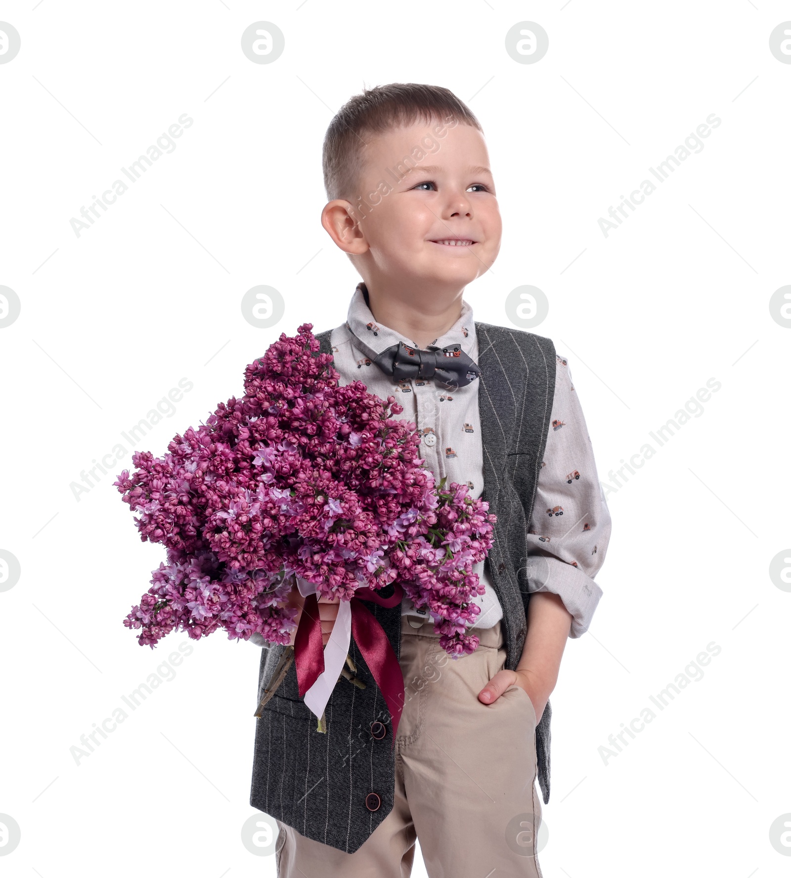 Little boy with bouquet of lilac flowers on white background Photo of Little boy with bouquet of lilac flowers on white background