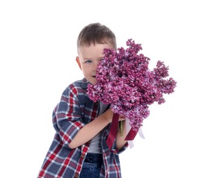 Photo of Little boy with bouquet of lilac flowers on white background