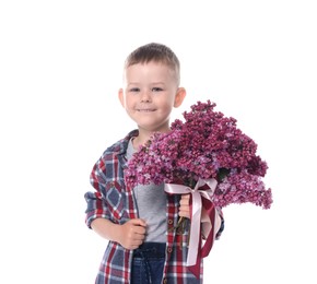 Photo of Little boy with bouquet of lilac flowers on white background