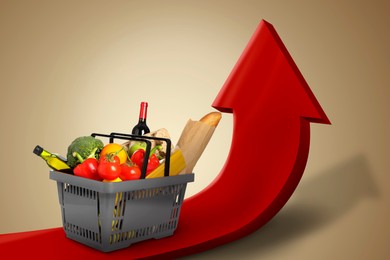 Image of Shopping basket with different groceries on upward red arrow against beige gradient background. Rising cost for food basket. Consumer Price Index
