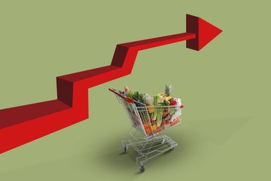 Image of Shopping cart with different groceries and red arrow against olive color background. Rising cost for food basket. Consumer Price Index