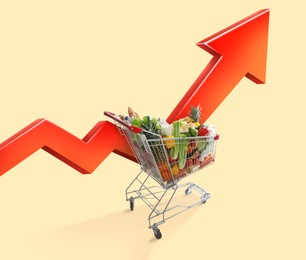Image of Shopping cart with different groceries and upward red arrow against beige background. Rising cost for food basket. Consumer Price Index