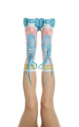 Photo of Woman in roller skates on white background, closeup