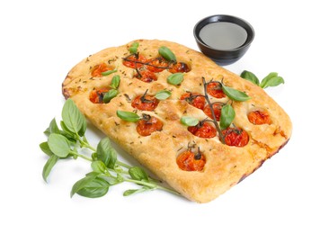 Photo of Delicious focaccia with tomatoes, spices and oil isolated on white