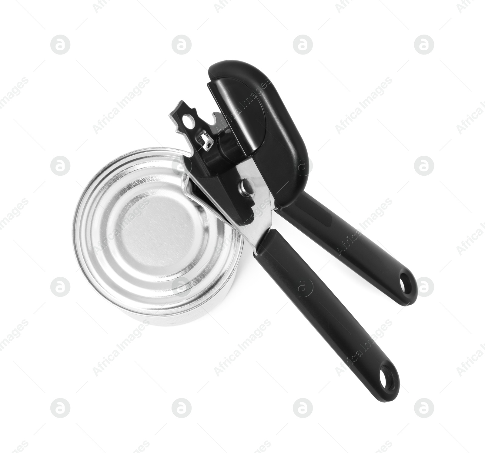 Can opener and tin isolated on white, top view Photo of Can opener and tin isolated on white, top view