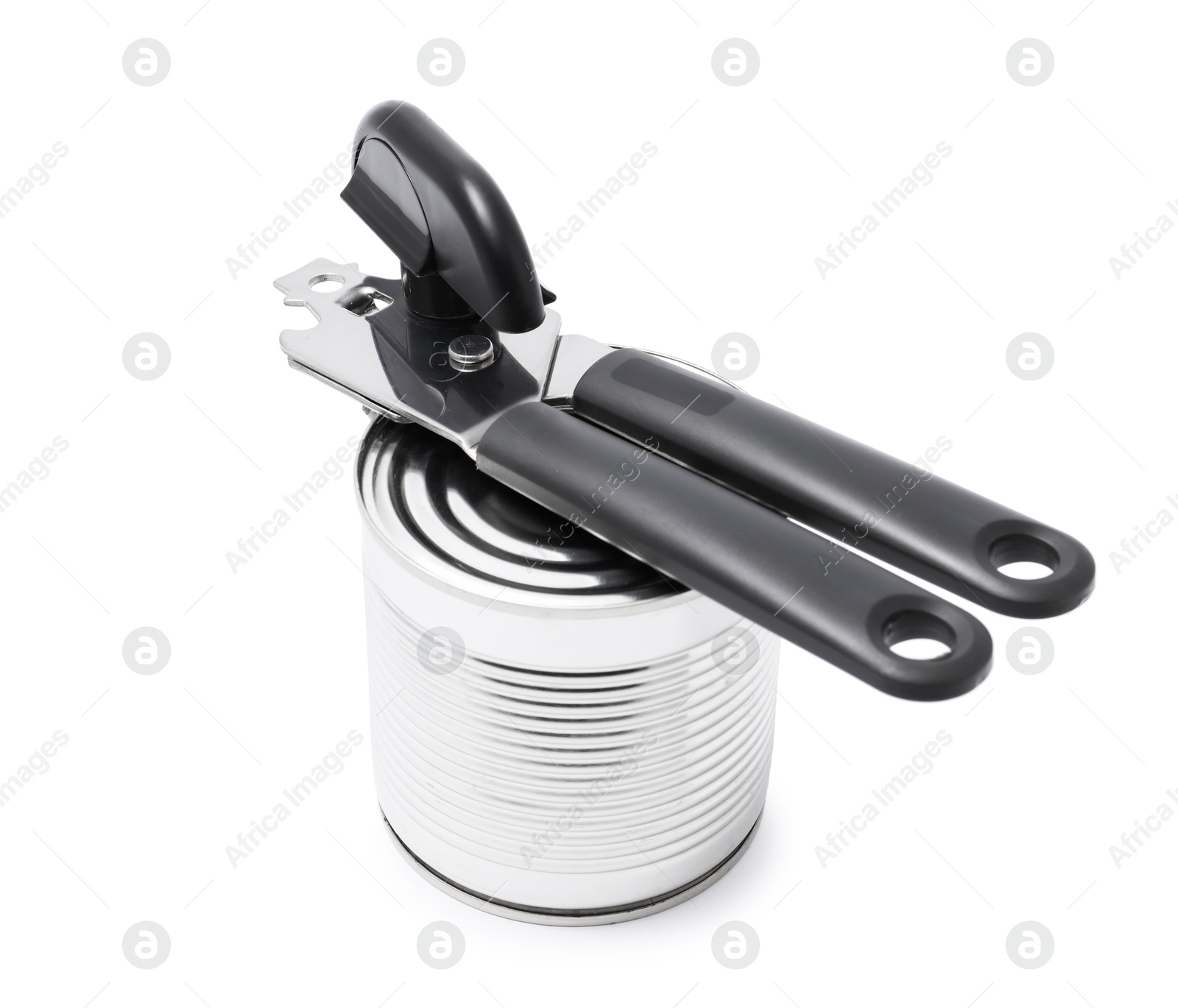 Can opener and tin isolated on white Photo of Can opener and tin isolated on white