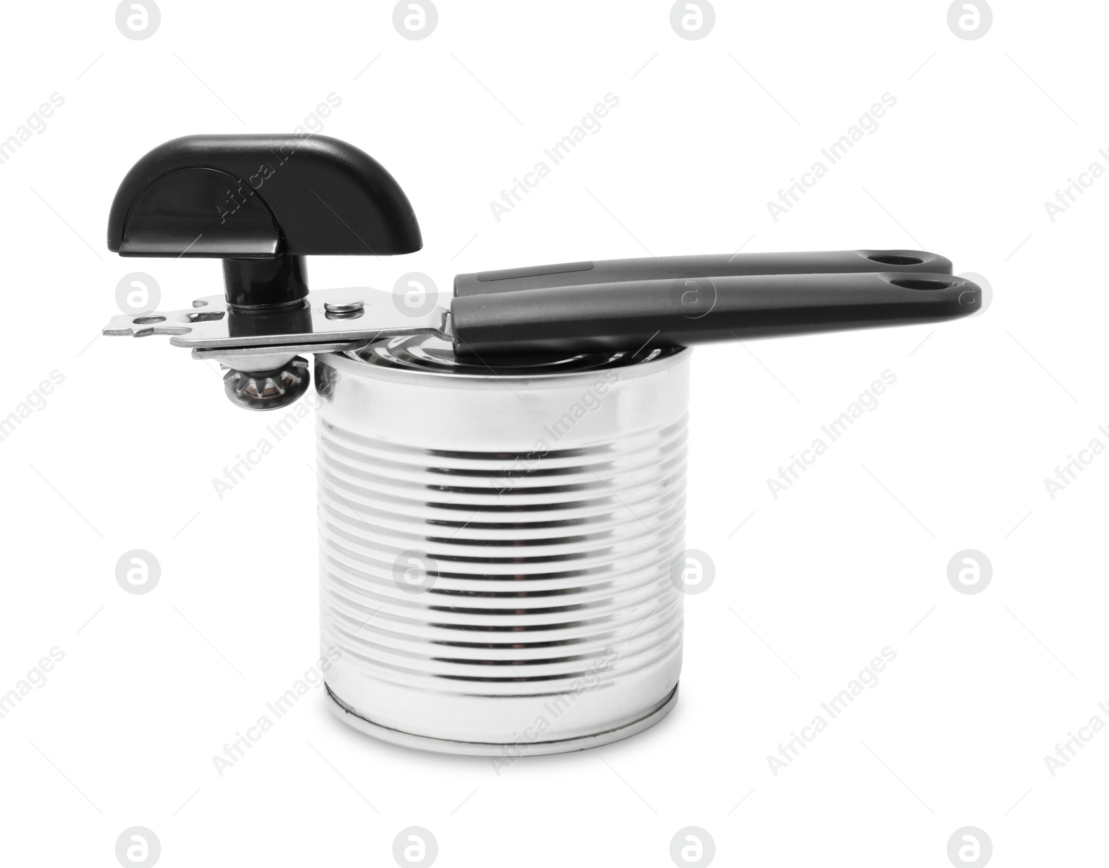 Can opener and tin isolated on white Photo of Can opener and tin isolated on white