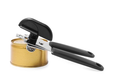 Photo of Can opener and tin isolated on white
