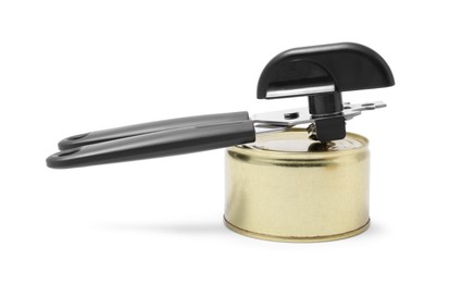 Photo of Can opener and tin isolated on white