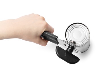 Photo of Woman opening tin with can opener on white background, top view