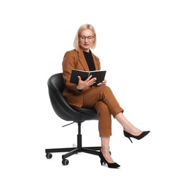 Photo of Professional psychologist with notebook in office chair on white background