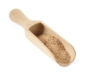 Photo of Nutmeg powder in scoop isolated on white