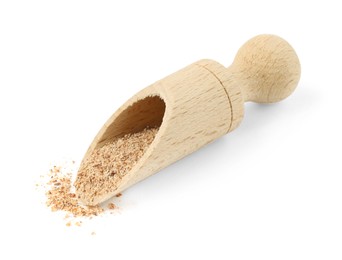 Photo of Nutmeg powder in scoop isolated on white