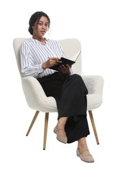 Photo of Professional psychologist with notebook and pen in armchair on white background