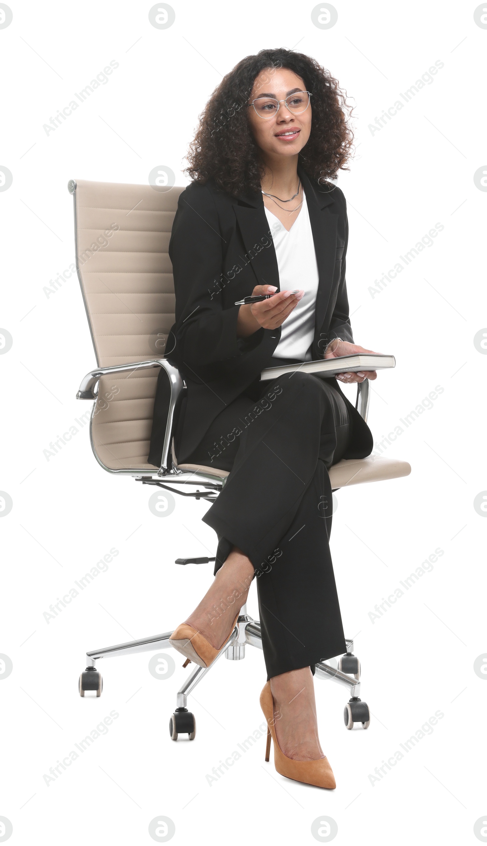 Professional psychologist with notebook and pen in office chair on white background Photo of Professional psychologist with notebook and pen in office chair on white background