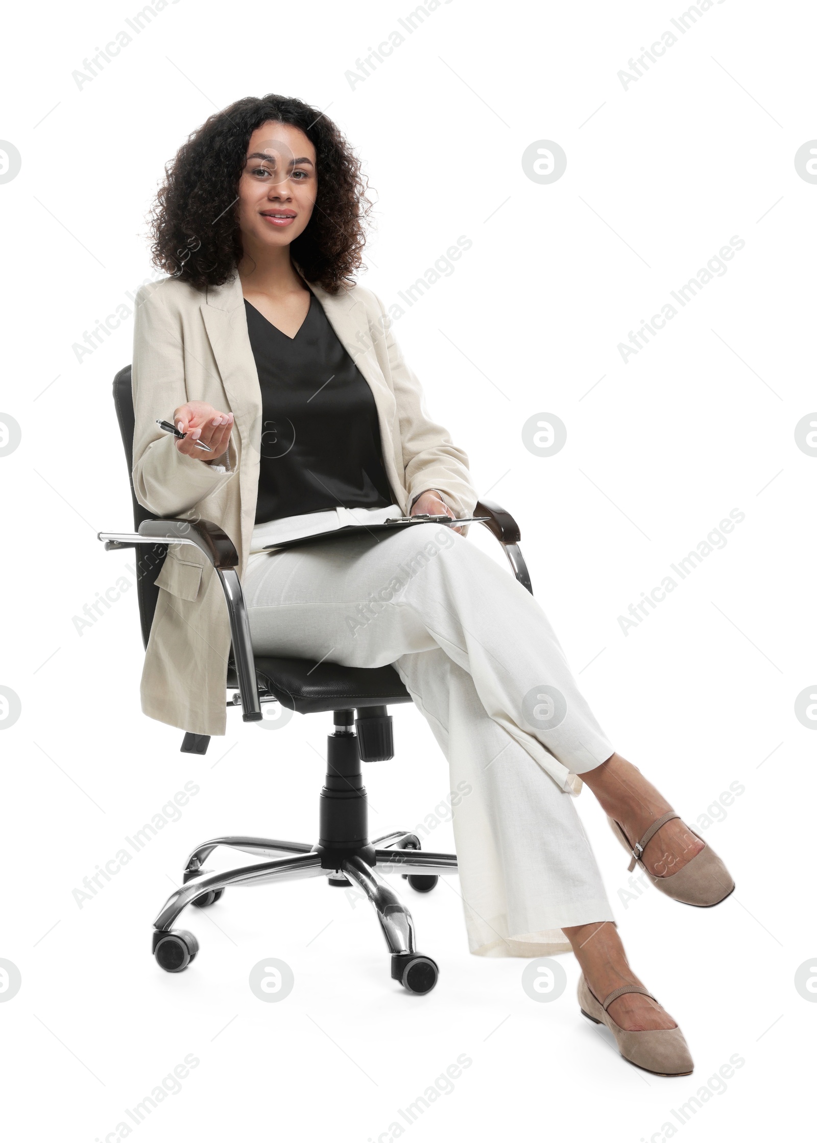 Professional psychologist with clipboard and pen in office chair on white background Photo of Professional psychologist with clipboard and pen in office chair on white background