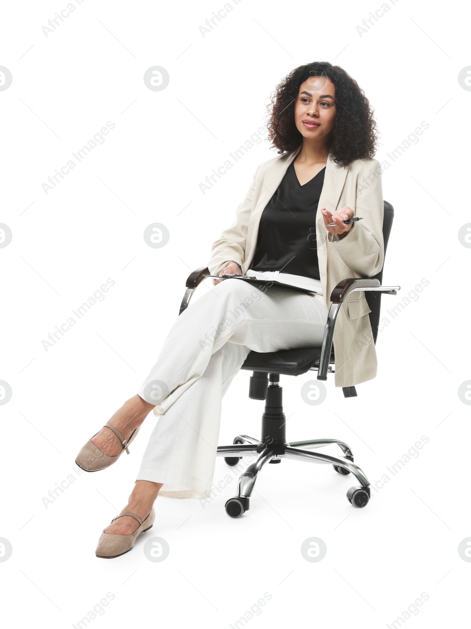 Professional psychologist with clipboard and pen in office chair on white background Photo of Professional psychologist with clipboard and pen in office chair on white background