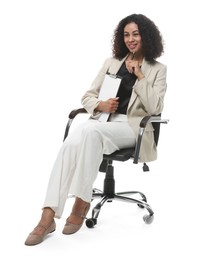 Photo of Professional psychologist with clipboard and pen in office chair on white background