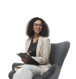 Photo of Professional psychologist with clipboard and pen in armchair on white background
