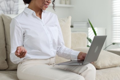 Photo of Professional psychologist working with laptop in office, closeup