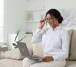 Photo of Professional psychologist working with laptop in office
