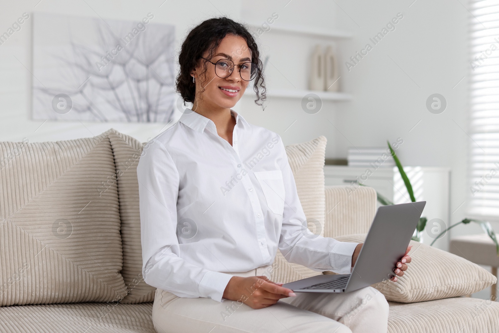 Professional psychologist working with laptop in office Photo of Professional psychologist working with laptop in office
