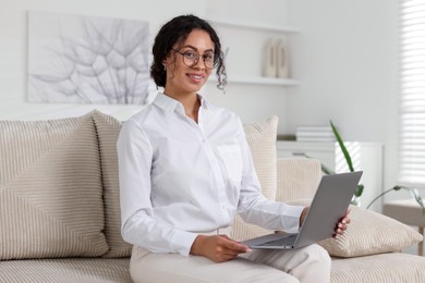 Photo of Professional psychologist working with laptop in office