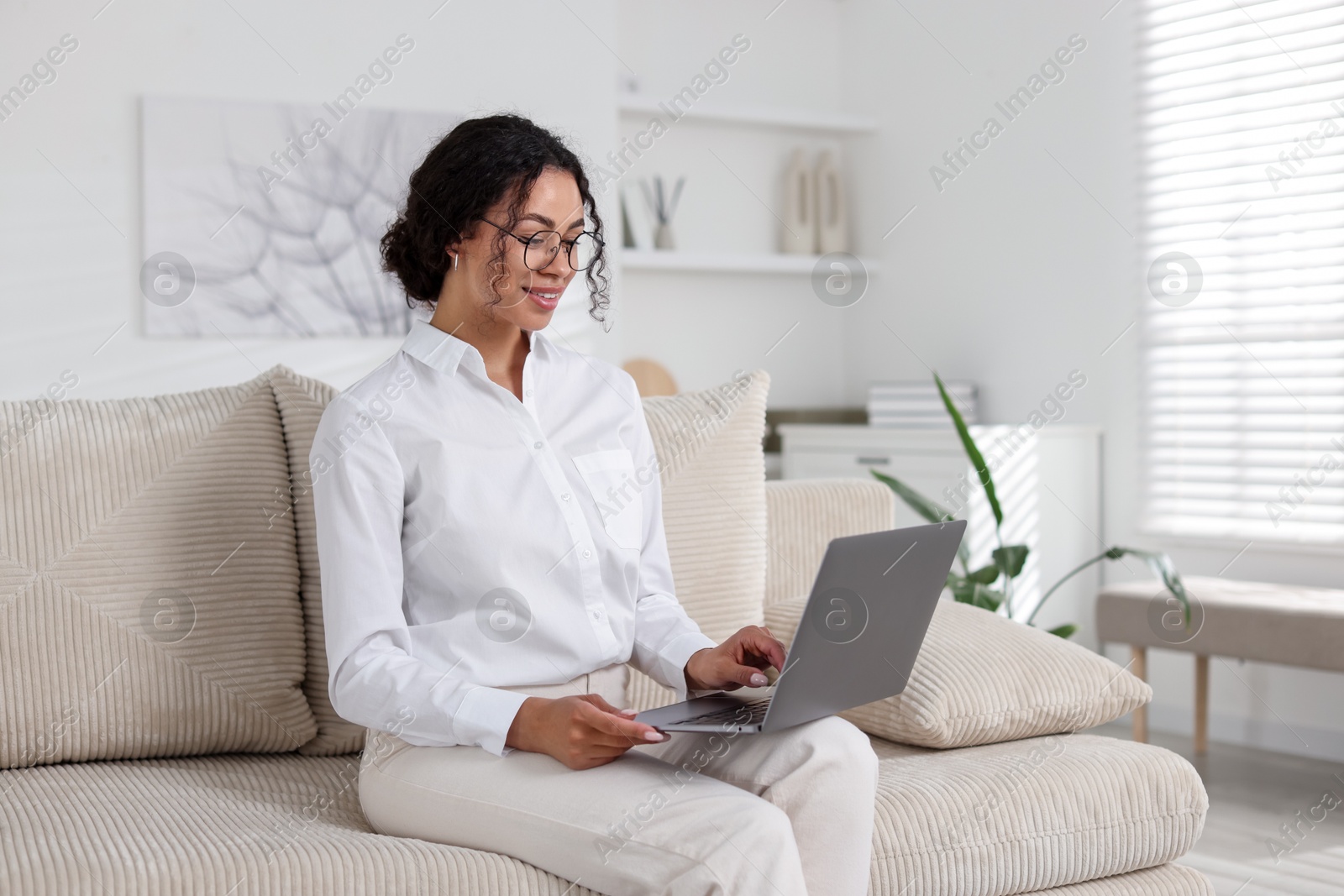 Professional psychologist working with laptop in office Photo of Professional psychologist working with laptop in office
