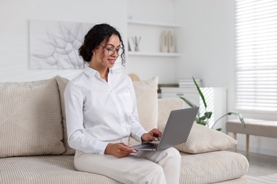 Photo of Professional psychologist working with laptop in office
