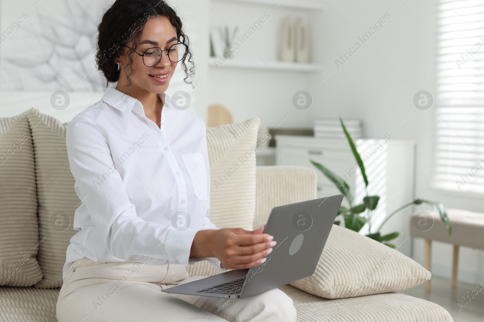 Professional psychologist working with laptop in office Photo of Professional psychologist working with laptop in office