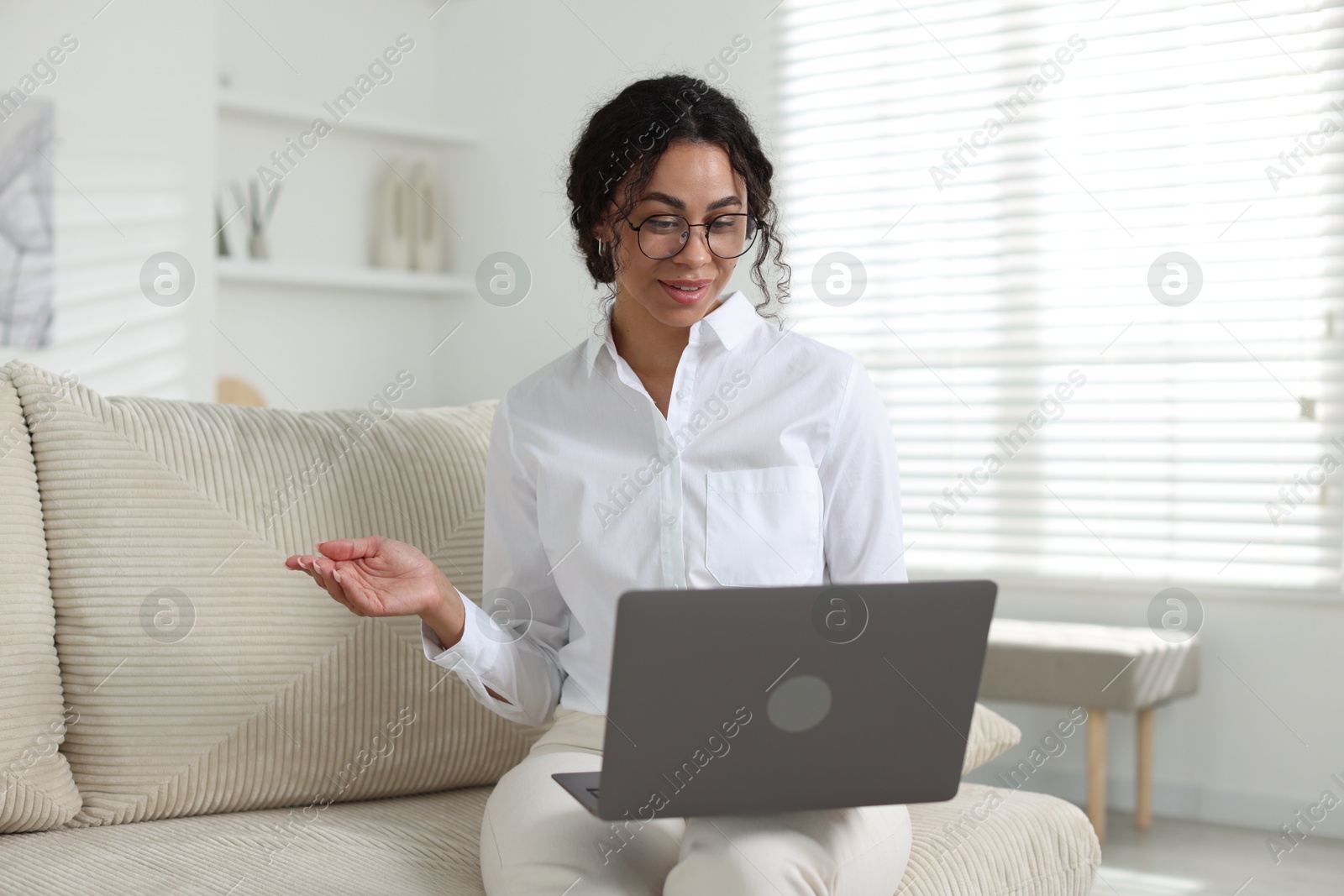 Professional psychologist working with laptop in office Photo of Professional psychologist working with laptop in office