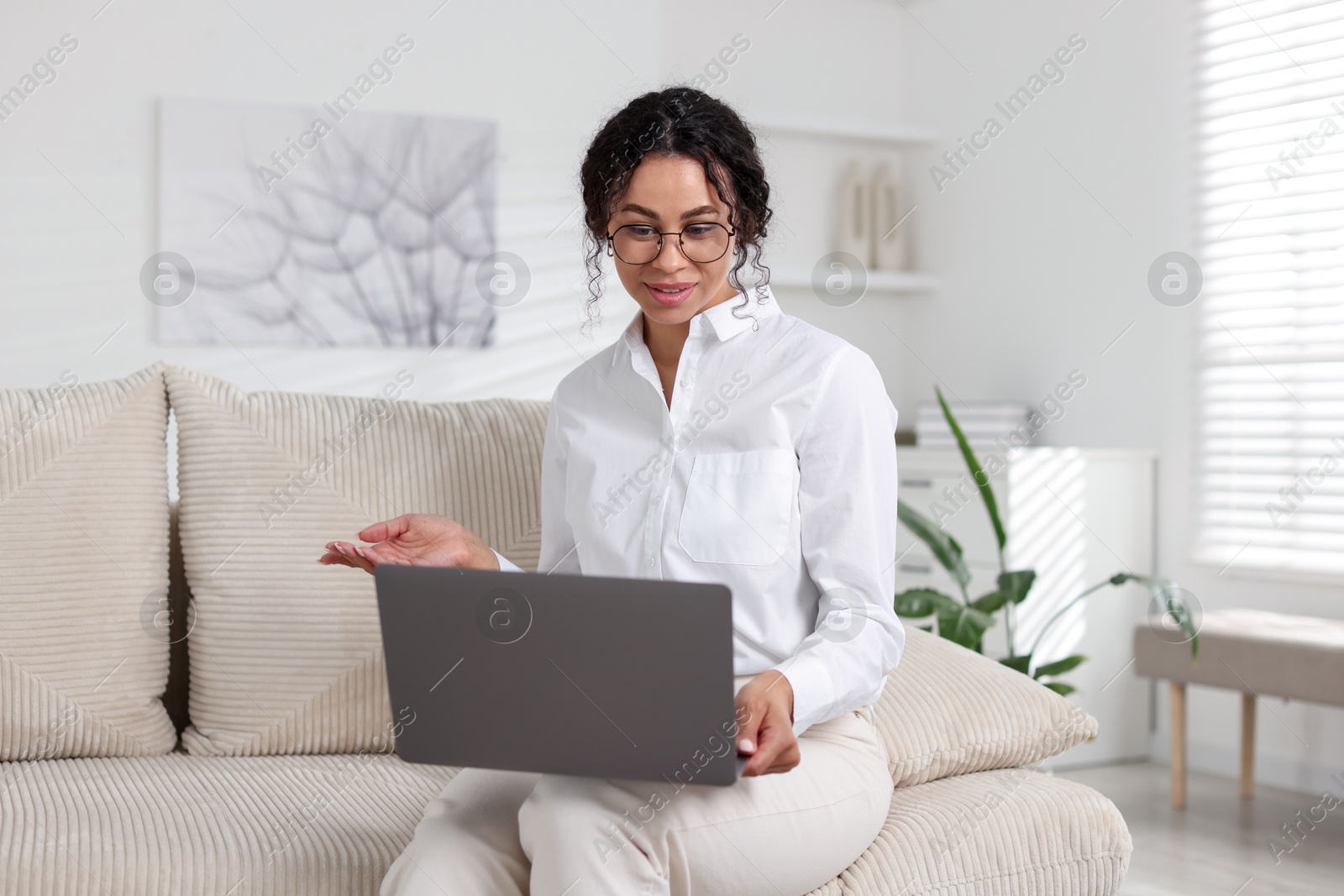 Professional psychologist working with laptop in office Photo of Professional psychologist working with laptop in office
