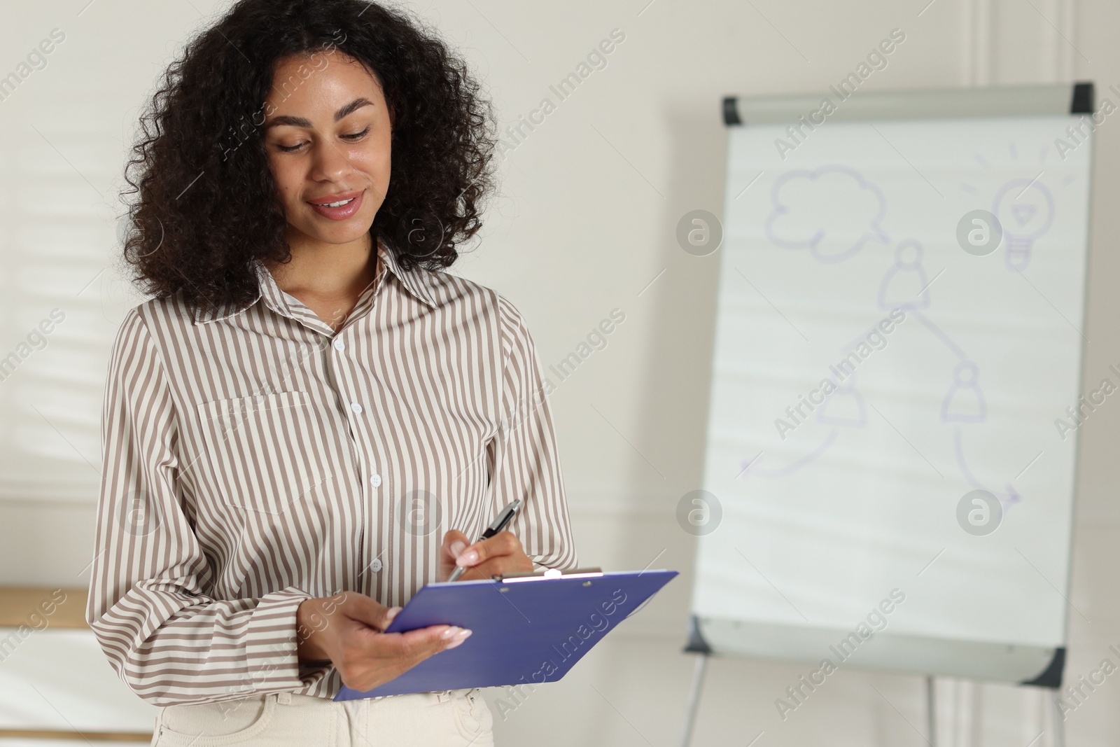 Professional psychologist taking notes in office, space for text Photo of Professional psychologist taking notes in office, space for text