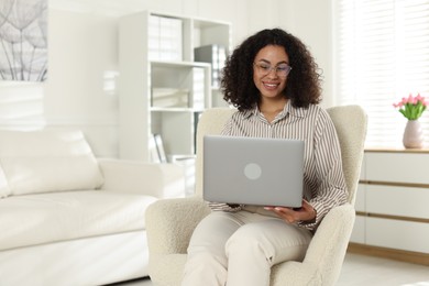 Photo of Professional psychologist working with laptop in office