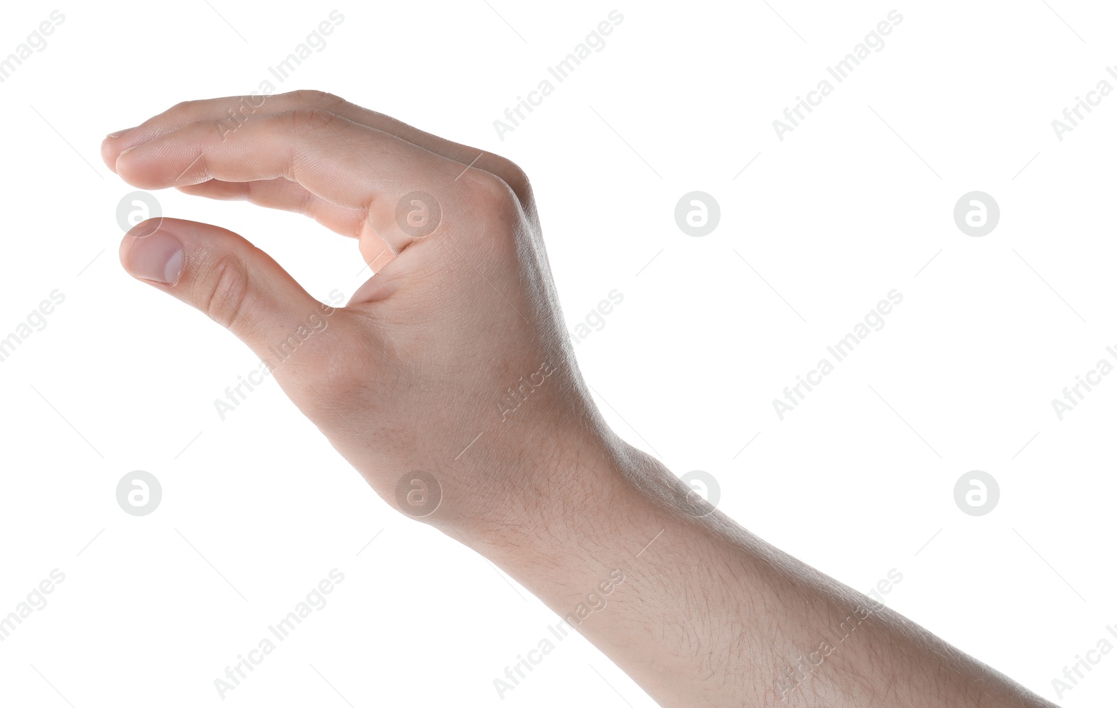 Man holding something in hand on white background, closeup Photo of Man holding something in hand on white background, closeup