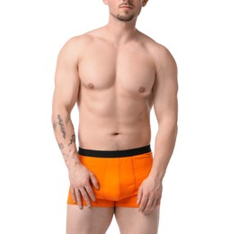 Photo of Young man in stylish orange underwear on white background, closeup