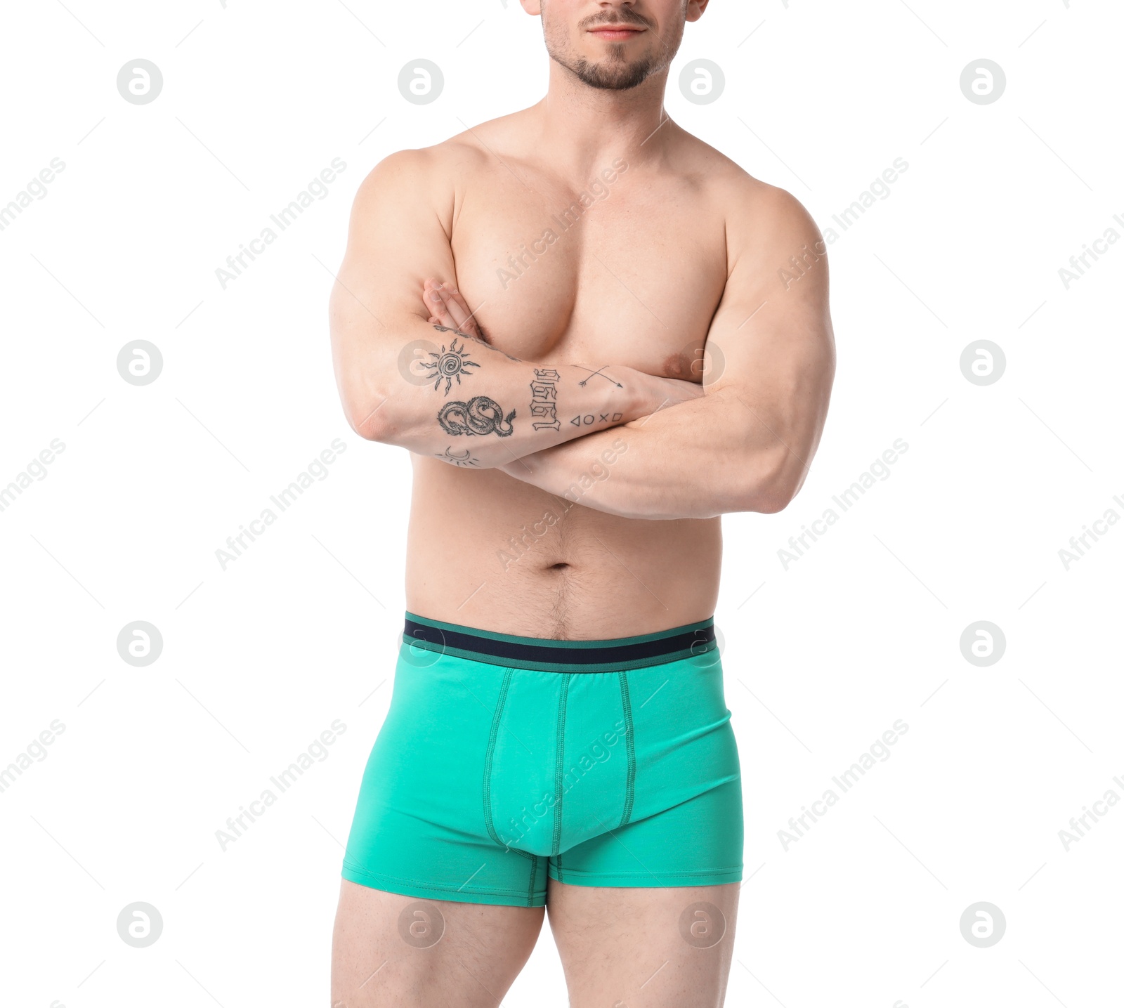 Young man in stylish turquoise underwear on white background, closeup Photo of Young man in stylish turquoise underwear on white background, closeup