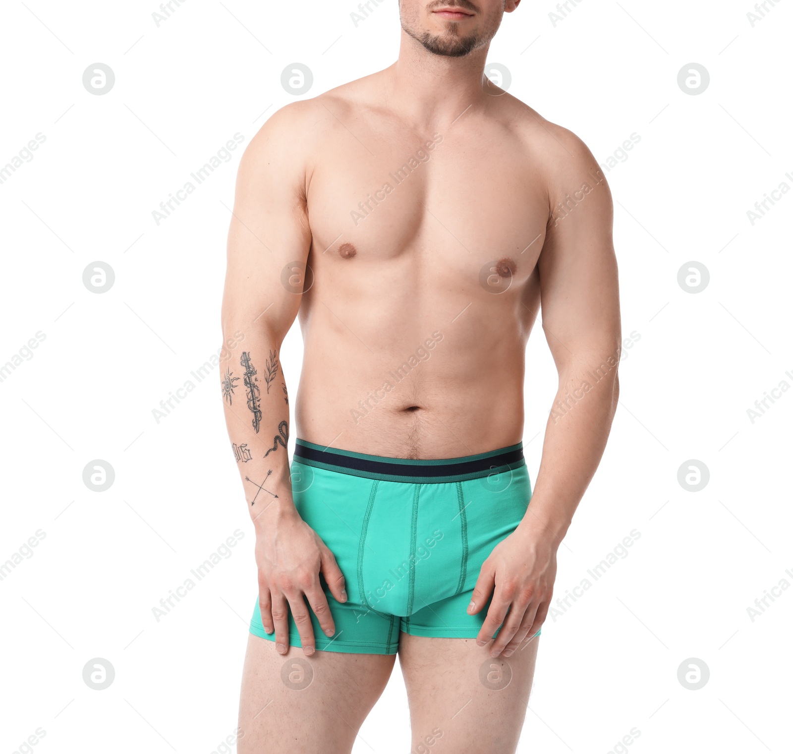 Young man in stylish turquoise underwear on white background, closeup Photo of Young man in stylish turquoise underwear on white background, closeup