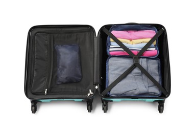 Photo of Open suitcase with packing cubes isolated on white, top view