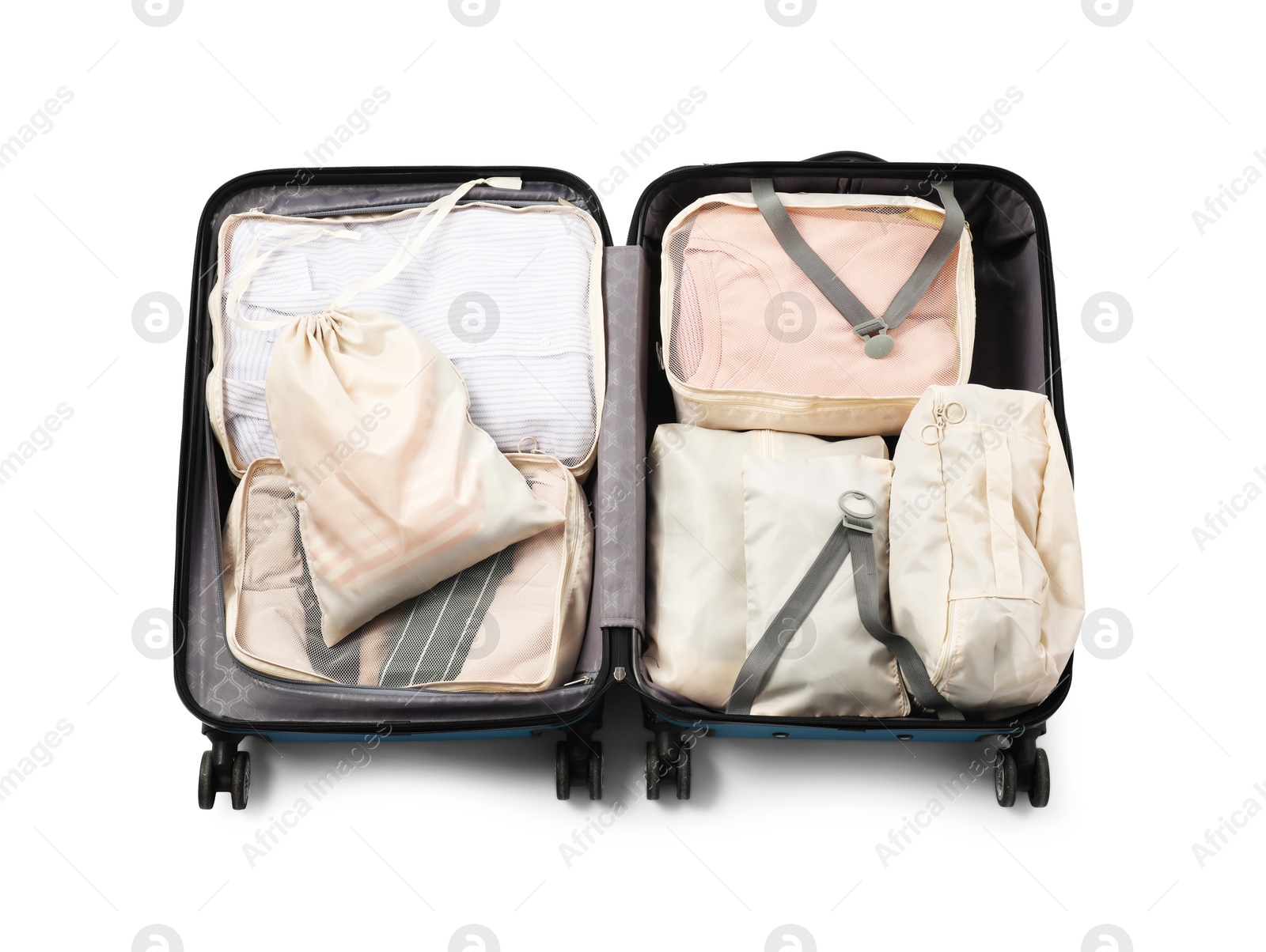 Open suitcase with packing cubes isolated on white, top view Photo of Open suitcase with packing cubes isolated on white, top view