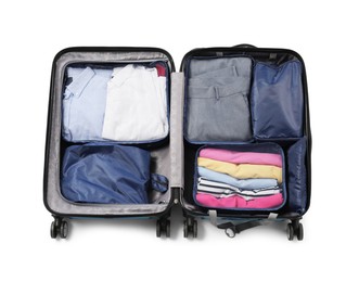 Photo of Open suitcase with packing cubes isolated on white, top view