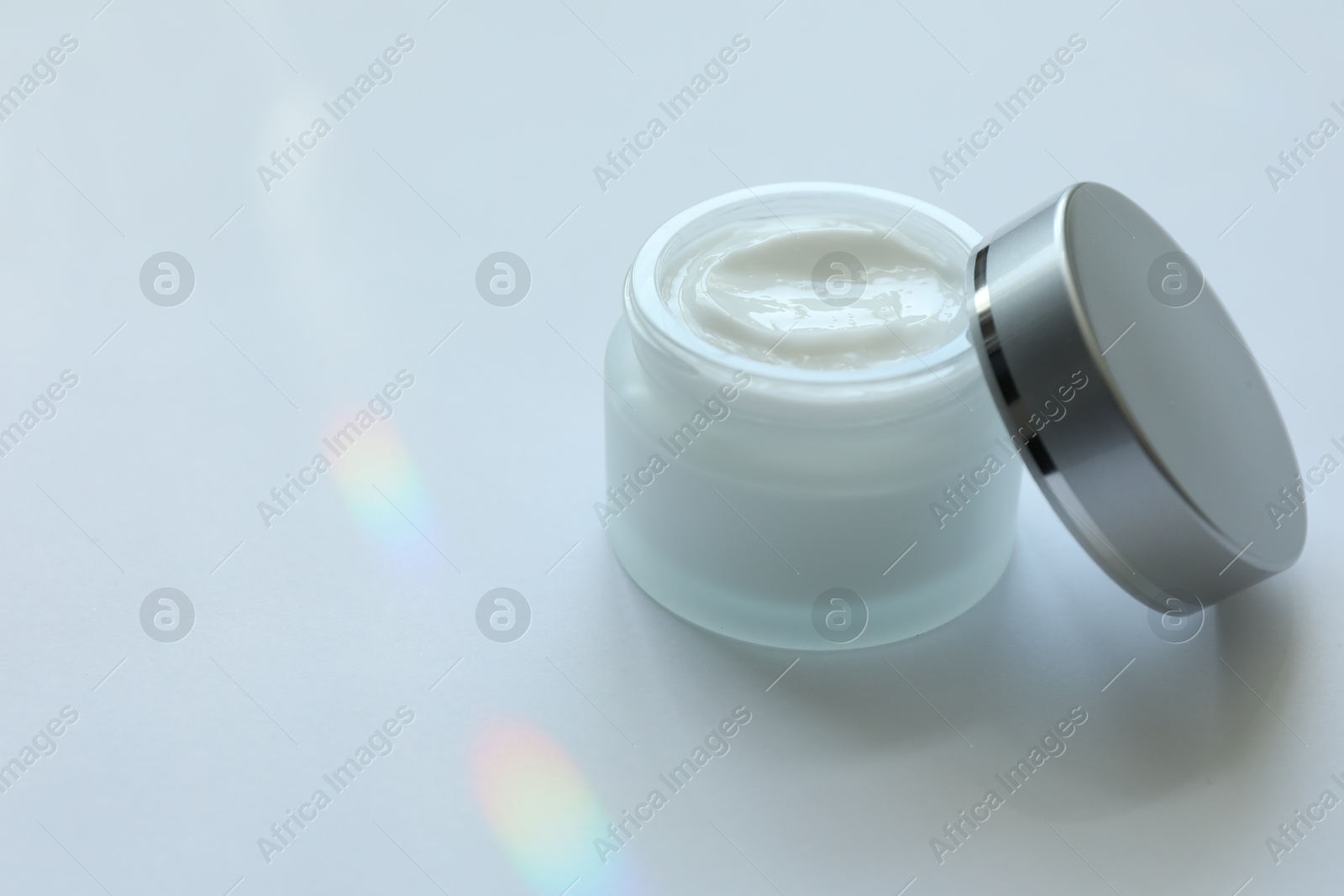 Jar of body cream on white background, closeup. Space for text Photo of Jar of body cream on white background, closeup. Space for text