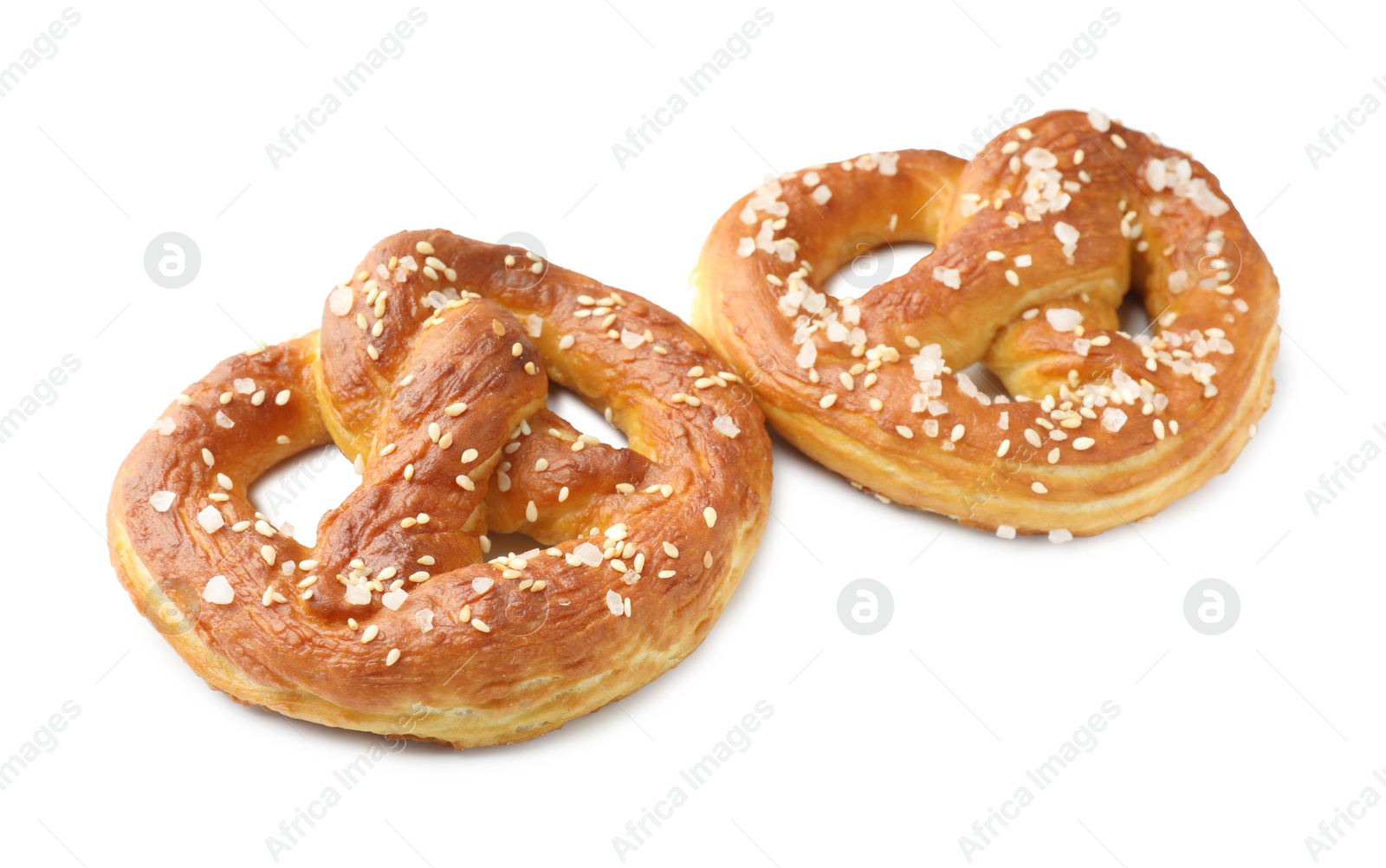 Tasty pretzels with salt isolated on white Photo of Tasty pretzels with salt isolated on white